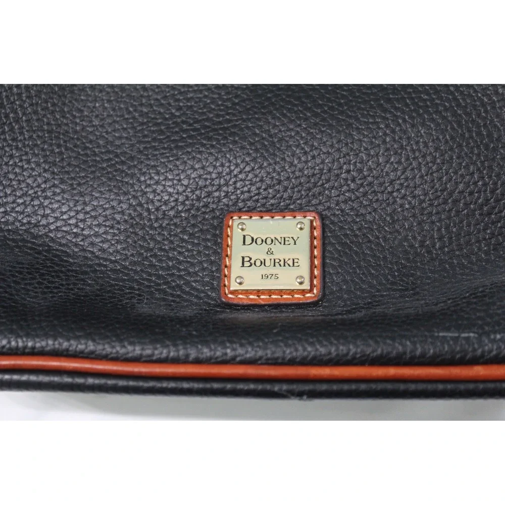 Dooney & Bourke Black Pebbled Leather Crossbody Bag with Tan Trim and Red Lining